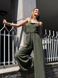 Tuta verde militare a palazzo spalline in catena