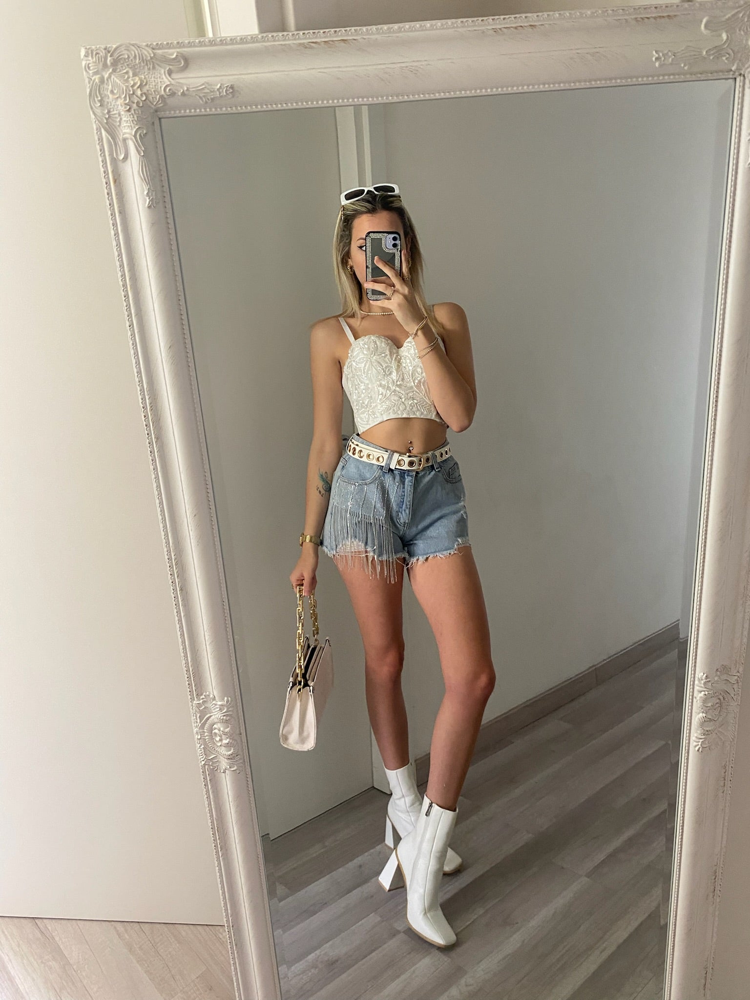 Top con ricami in paillettes bianco
