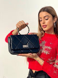 Borsa nera con manico e tracolla