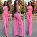 Tuta con piume rosa