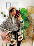 Cardigan maculato con frange e cinta