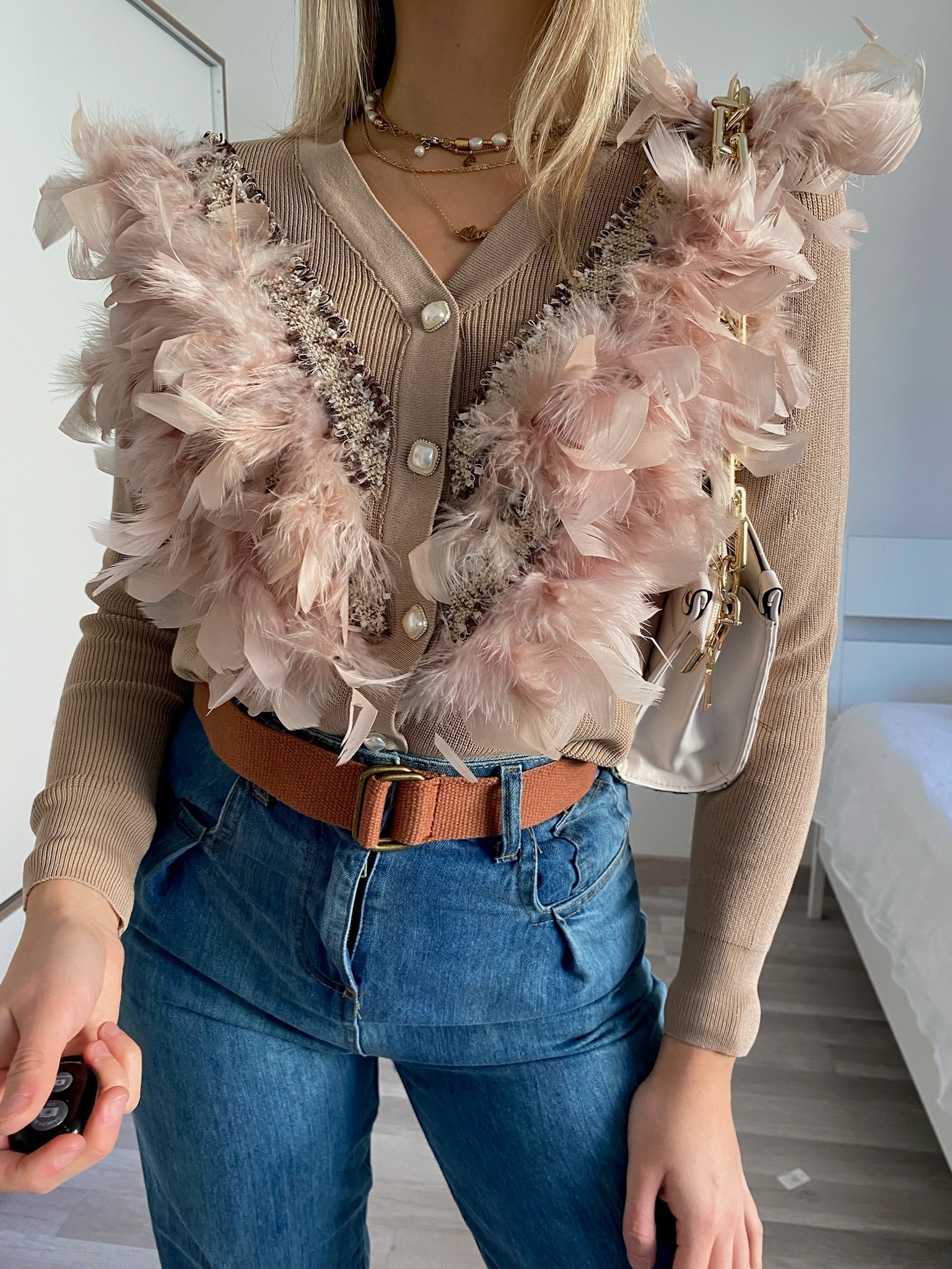 Maglione Nude con piume