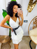 Abito corto bianco glitter con gonna asimmetrica