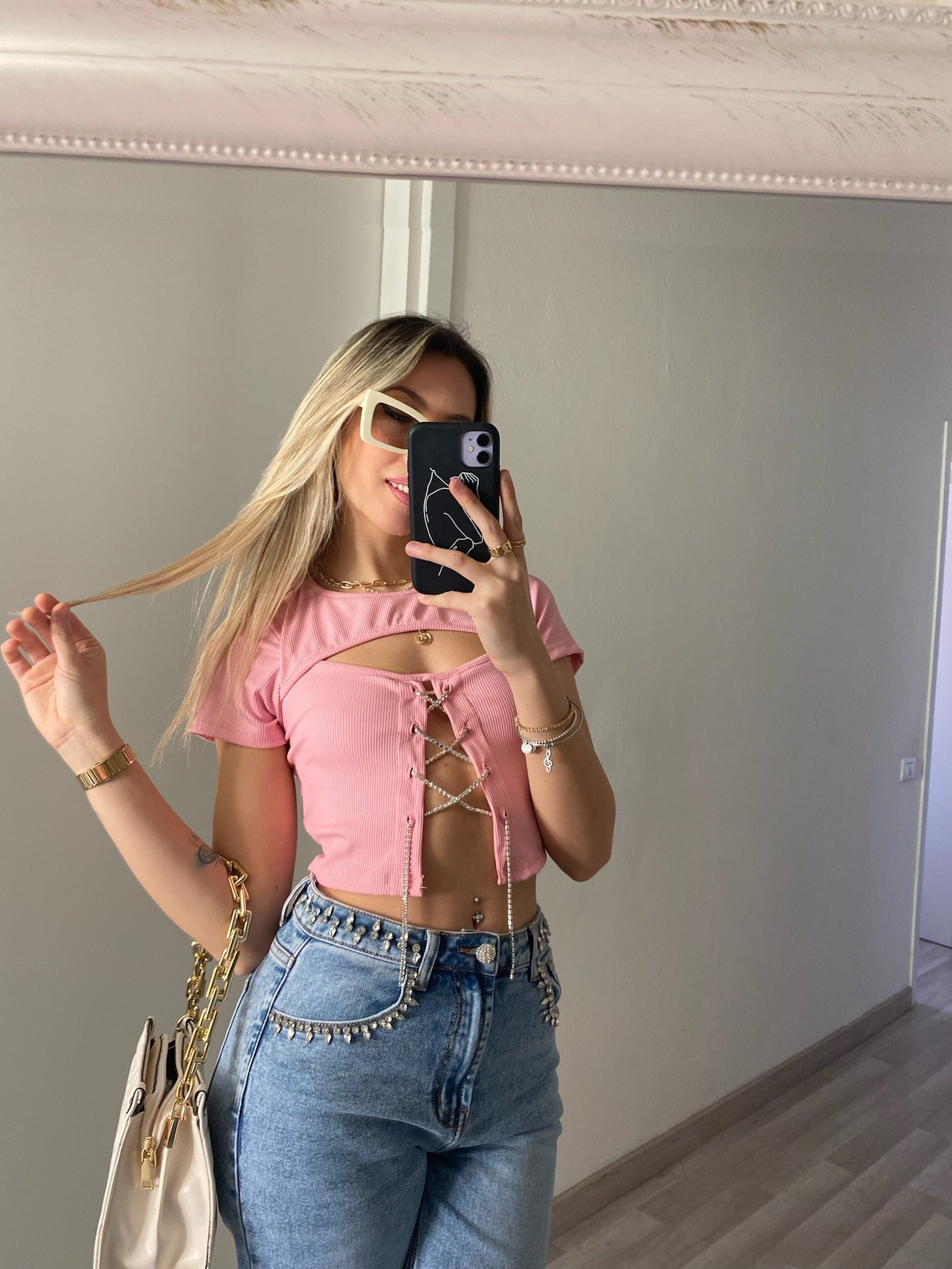 Top rosa con punto luce