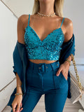 Top con paillettes petrolio