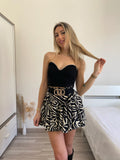 Top scollo a cuore con strass nero