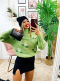 Maglione collo alto con rose verde