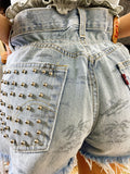 Short Vintage Levi’s jeans chiaro con palme e borchie argento