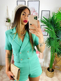 Completo verde con bottoni oro