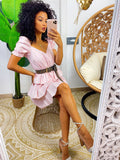 Abito a balze in cotone con manica rosa