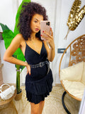 Abito corto nero glitter con gonna asimmetrica