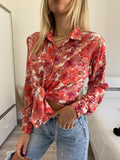 Camicia floreale corallo