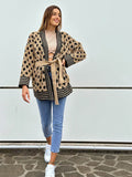 Cardigan con frange a rombi nude