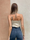 Top a costine beige spalline oro