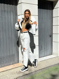 Giaccone di jeans nero pelo bianco