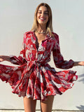 Abito con gonna a ruota rosso e rosa