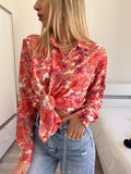 Camicia floreale corallo