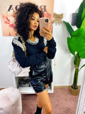 Short in ecopelle con catenina e cintura