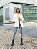 Jeans aderente sfrangiato sotto