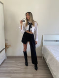 Gonna con rosa e camicia