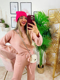 Completo maglia e pantalone largo rosa