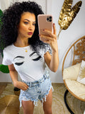 Short jeans chiaro con borchie