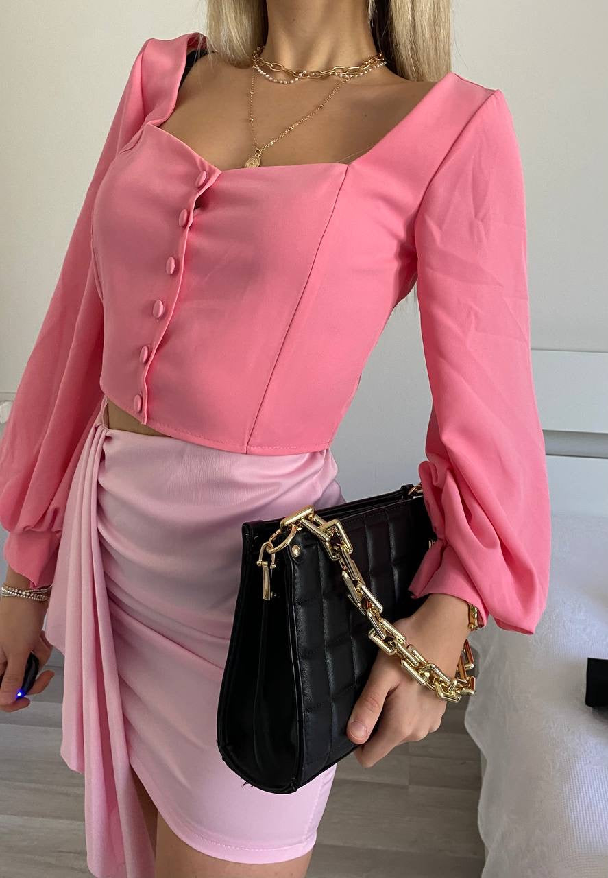 Top con bottoncini rosa