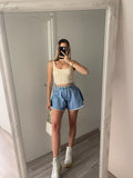 Short in jeans a farfalla
