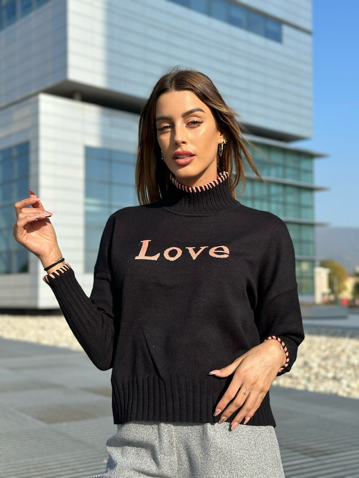Pull nero e rosa
