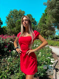 Abito rosso schiena incrociata