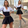 Salopette nera più camicia fiocchetto