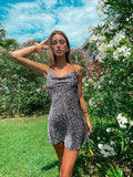 Abito a fiorellini schiena incrociata