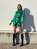 Abito in raso verde smeraldo