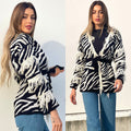 Cardigan zebrato nero con frange e cinta