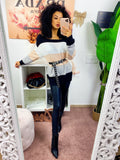 Maglione a righe bianco e rosa