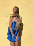 Abito in raso blu elettrico con punto luce