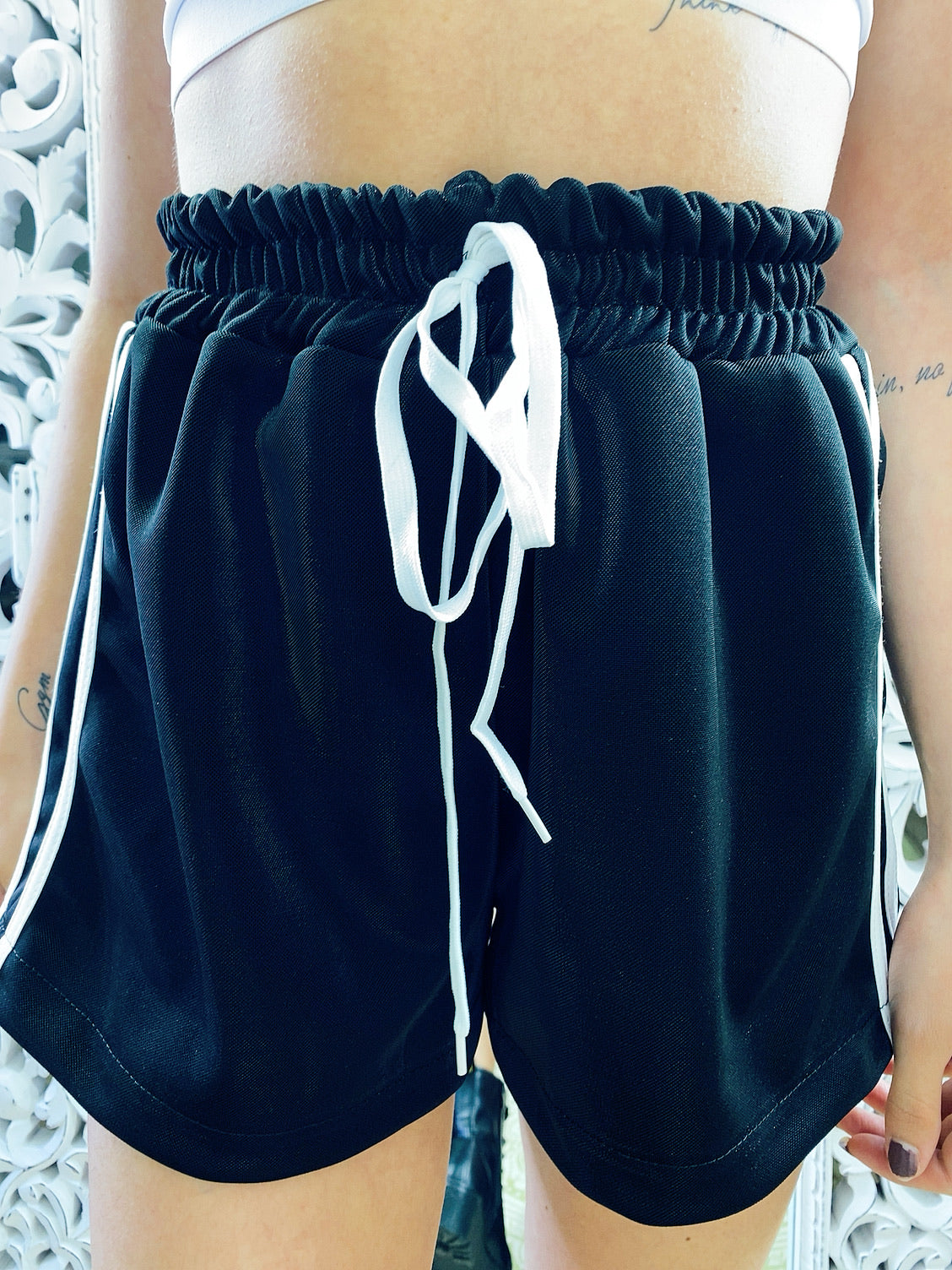 Short sportivo con righe