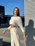 Maglioncino crop panna a trecce