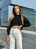 Pull nero rigo bianco