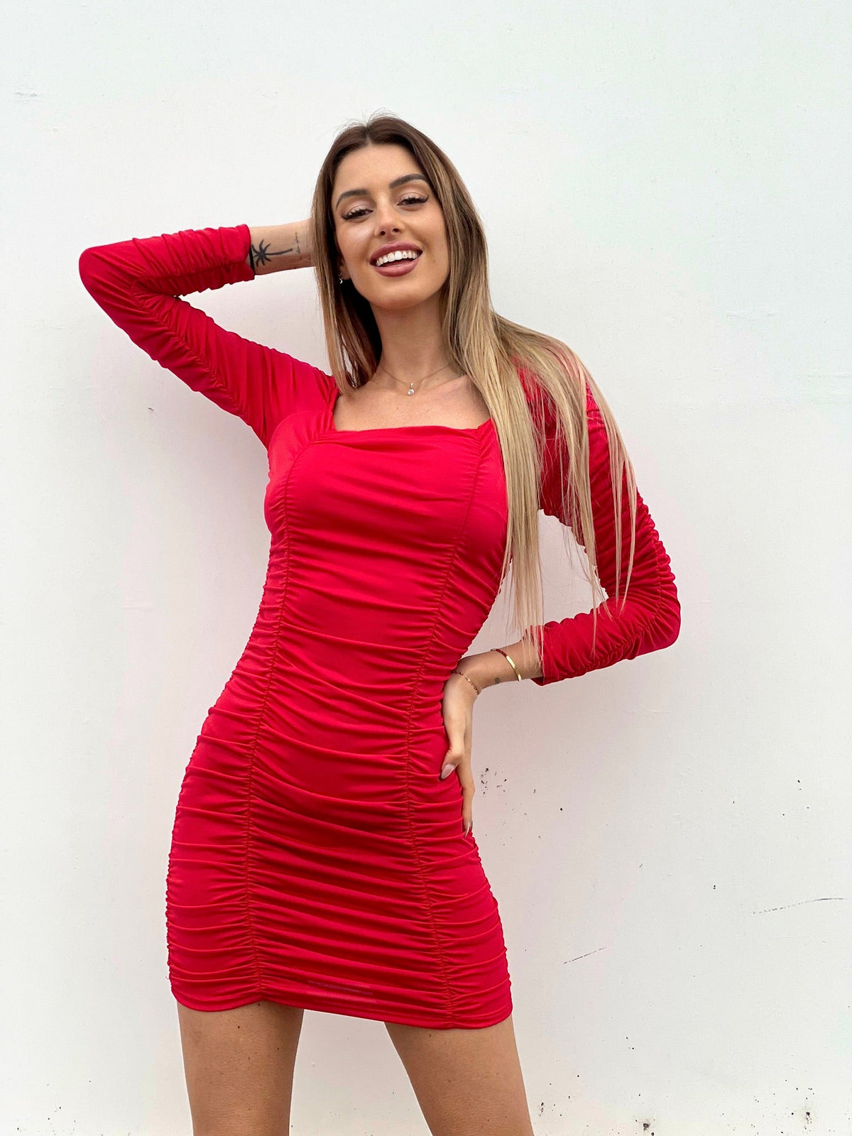 Abito rosso drappeggiato