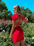 Abito rosso schiena incrociata