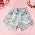 Short Vintage Levi’s chiaro con borchie