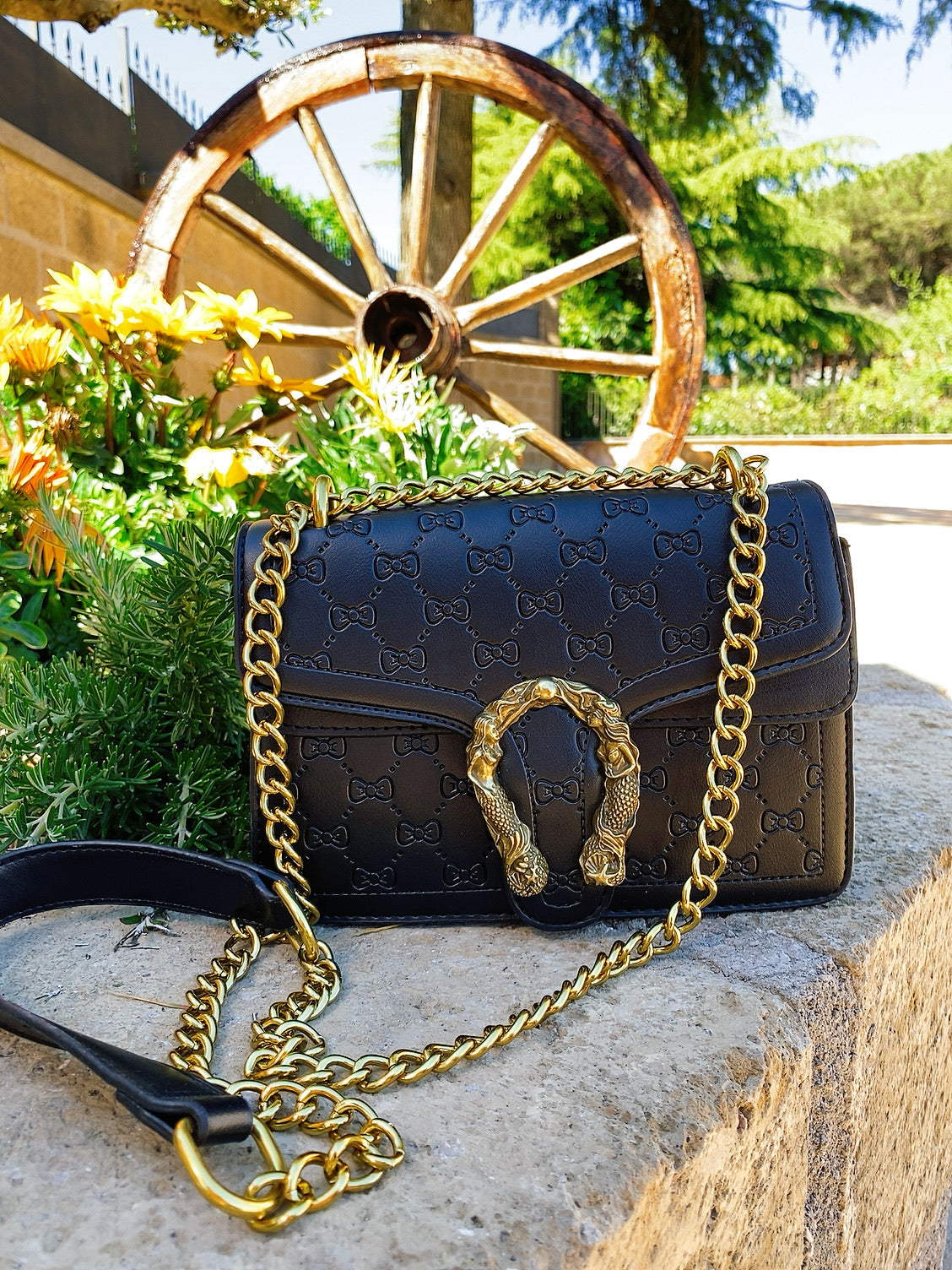 Pochette eco-pelle con ferro di cavallo
