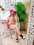 Completo maglia e pantalone largo rosa