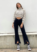 Jeans nero con V sfrangiata