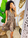 Abito animalier chiaro con incrocio