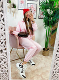 Completo sportivo con righe Rosa