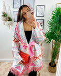Cardigan A rombi bianco con frange e cinta