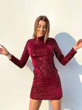 Abito schiena aperta in paillettes rosso