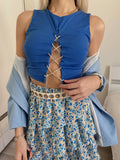 Top blu con punto luce